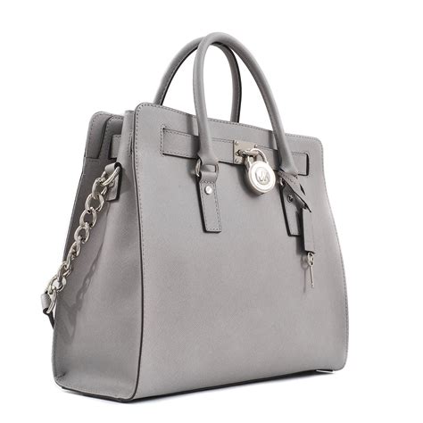 michael kors lg satchel luggage ns|Michael Kors luggage.